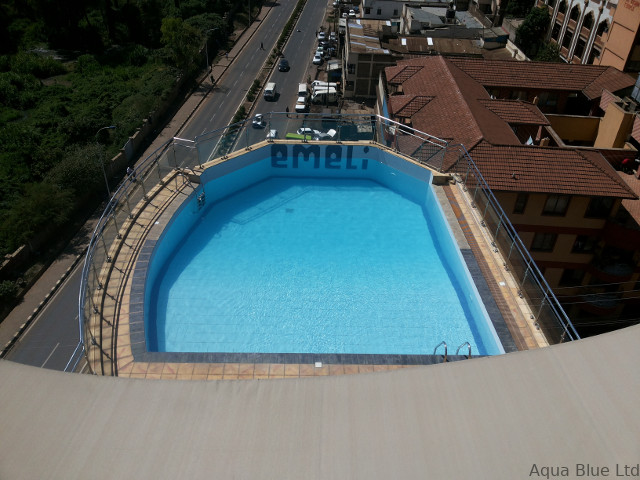Aerial view of a rooftop pool at an apartment complex in Nairobi