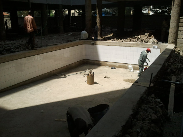 Krishna Group apartment pool: excavating, draining and building on a waterlogged site